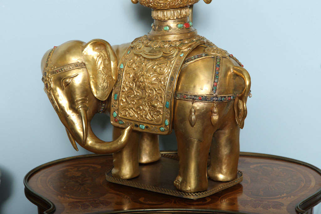 A  pair of ceremonial elephant lamps, late 19th century. 2