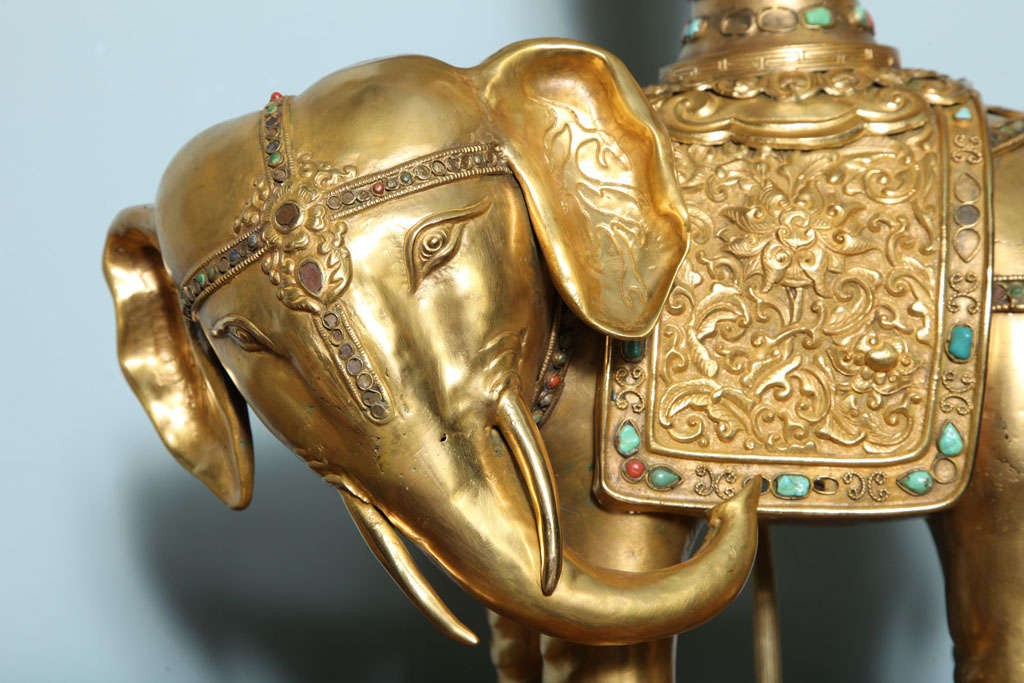 A  pair of ceremonial elephant lamps, late 19th century. 3