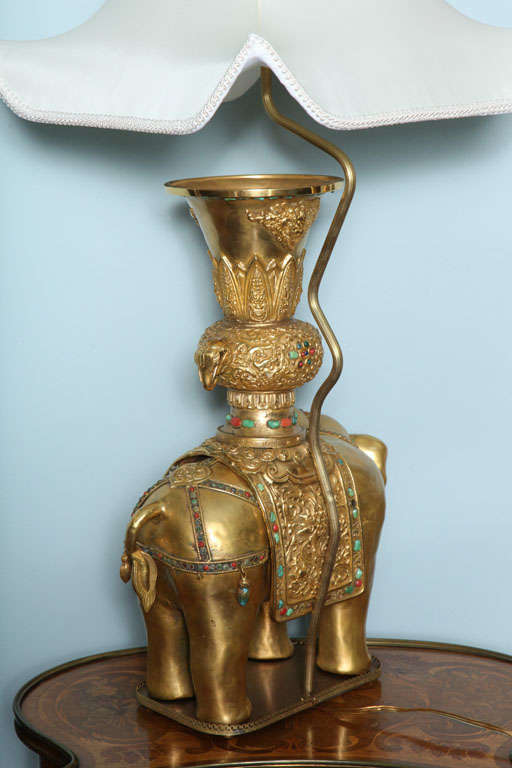 A  pair of ceremonial elephant lamps, late 19th century. 4