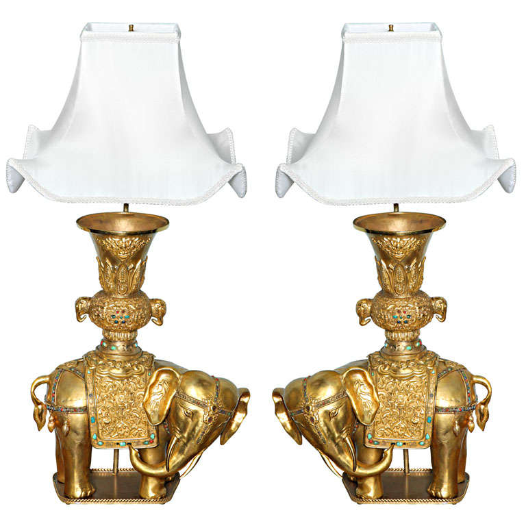 A  pair of ceremonial elephant lamps, late 19th century.