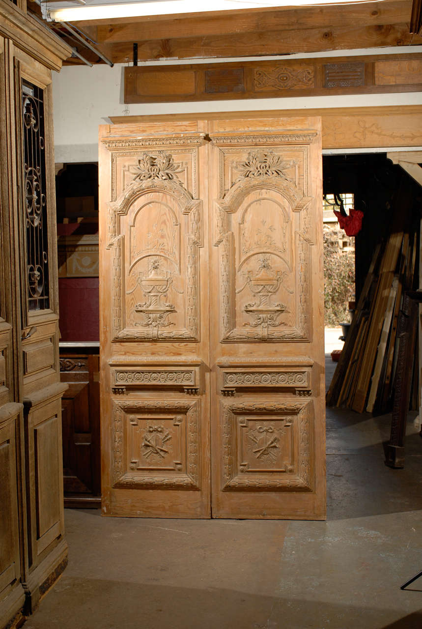 Exceptionally rare and very hard to find pairs of Louis XVI carved pine doors as shown. 4 pairs are available and came from a fine 