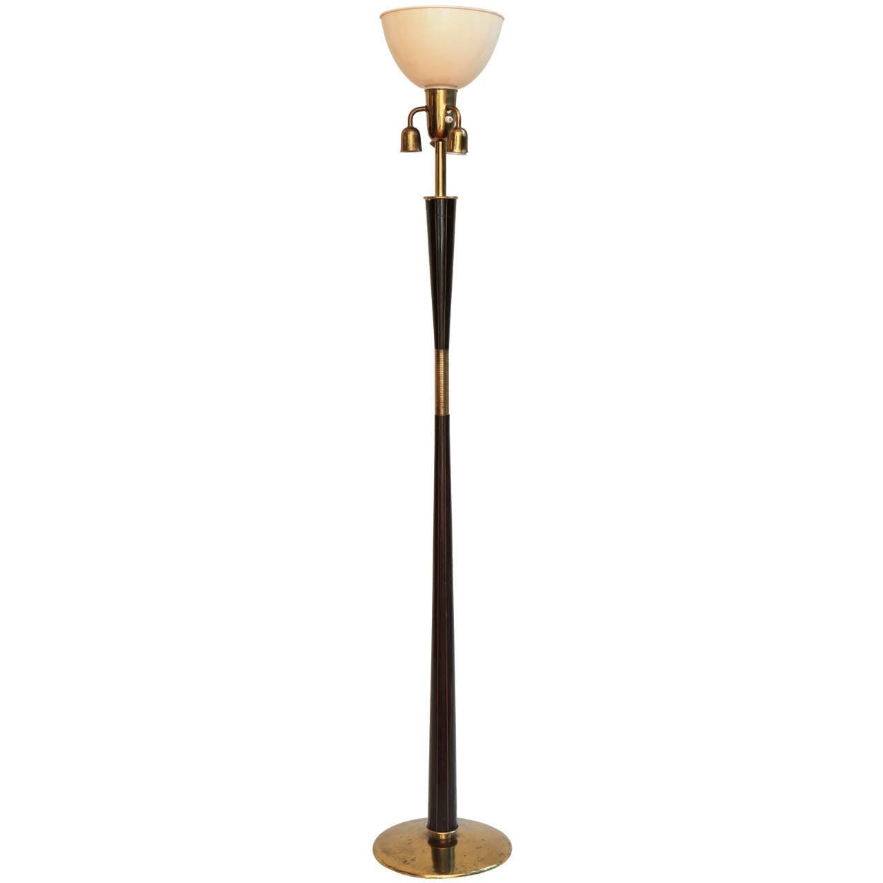 A big floor lamp, with brass details produced by Stilnovo, 1950.
Iconic Italian design lighting
four-light, cup in green silk
brass and polished turned
mahogany wood.
Original electrical system.
Measure: high cm 178, diameter cup 61 cm; brass