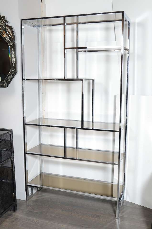 This outstanding etagere can be used to display decorative pieces or can make a great room divider. It is designed by Milo Baughman and is in mint condition.
