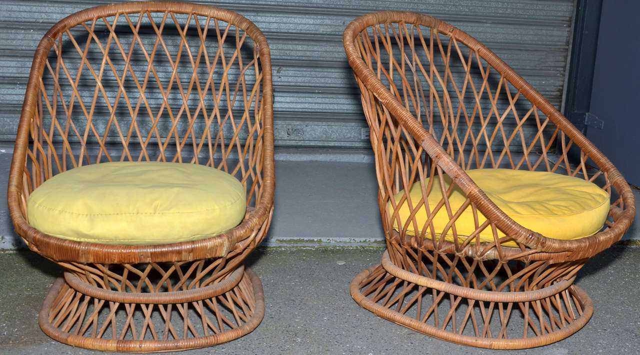 Three small 1950s wicker armchairs by  Jean RoyÃ??Ã?¨re, referenced in the book 