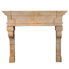 A large 17th C. French limestone castle fireplace / mantel piece