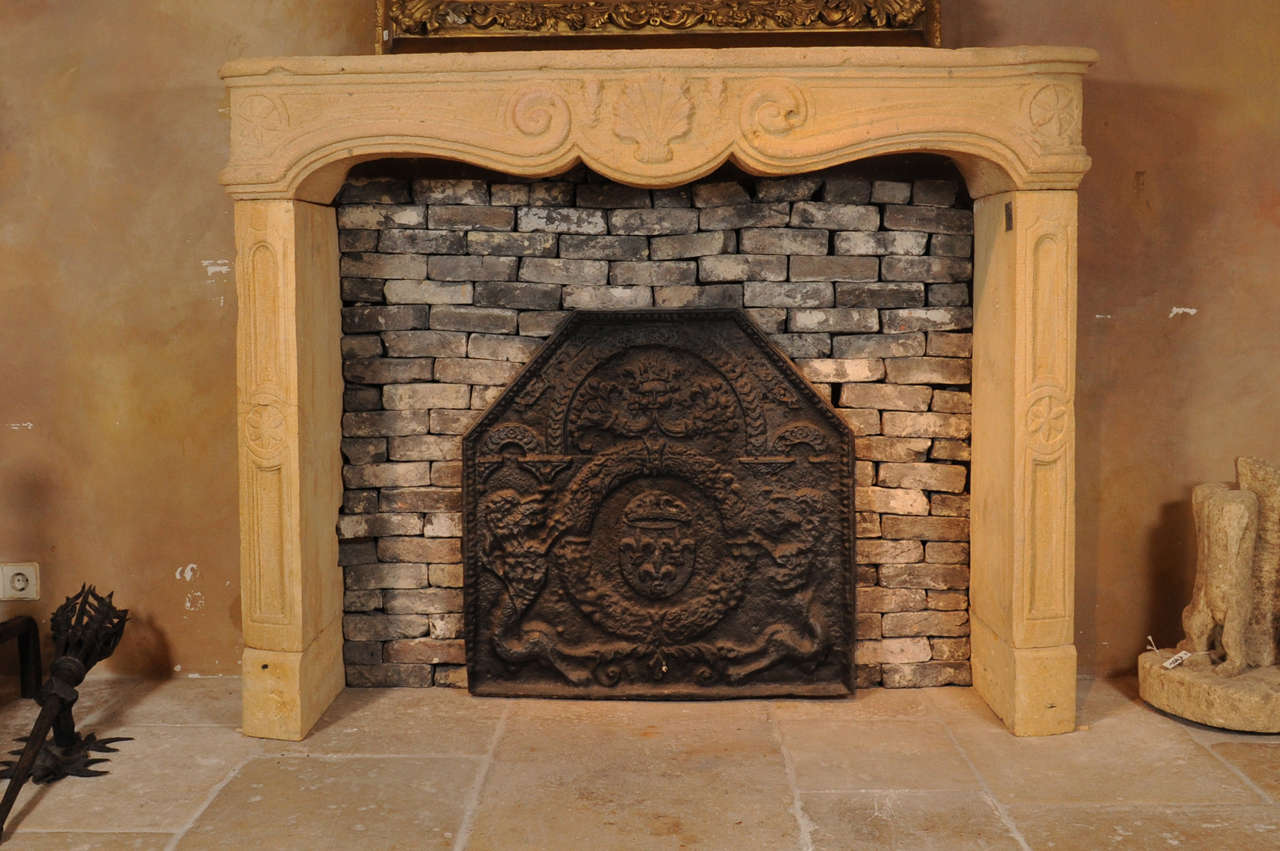 A mid 18th C. French Baroque fireplace / mantel piece