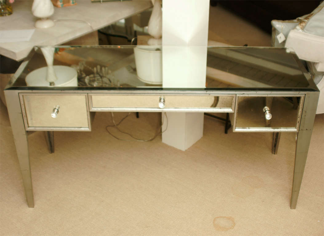 Attractive 3-drawer mirrored vanity/desk with silver gilt legs and trim