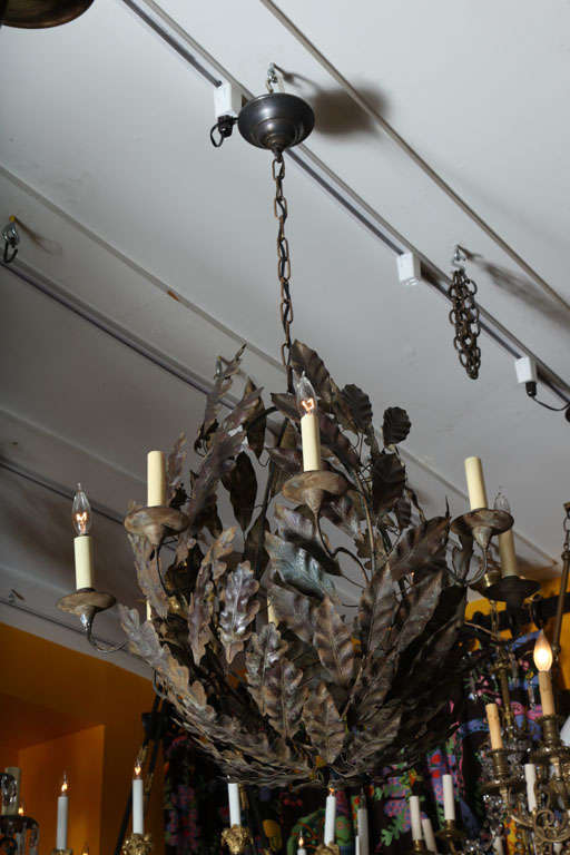 An Eight Light American Painted Tole Chandelier 4