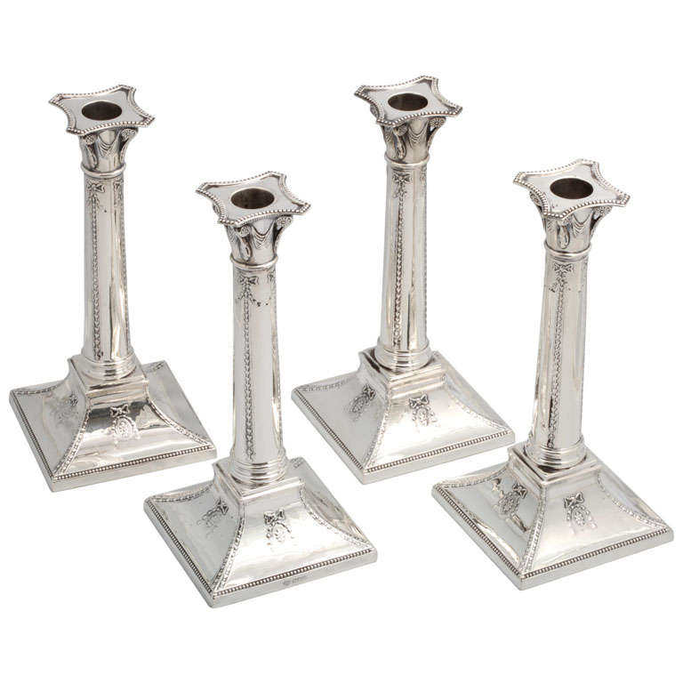 Set of Four Sterling Silver Neoclassical Column-Form Candlesticks