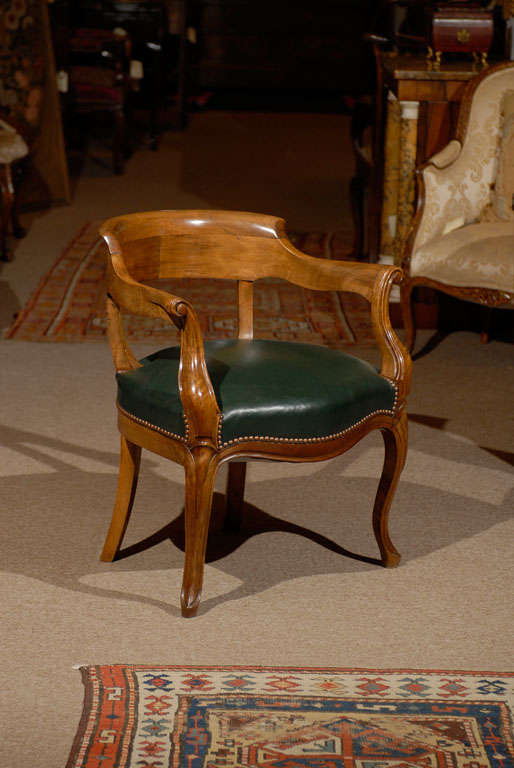 A Louis XV style walnut desk chair with green leather seat and cabriole feet.<br />
<br />
For many more fine antiques, please visit our online gallery at: www.williamwordantiques.com<br />
<br />
William Word Fine Antiques: Atlanta's source for