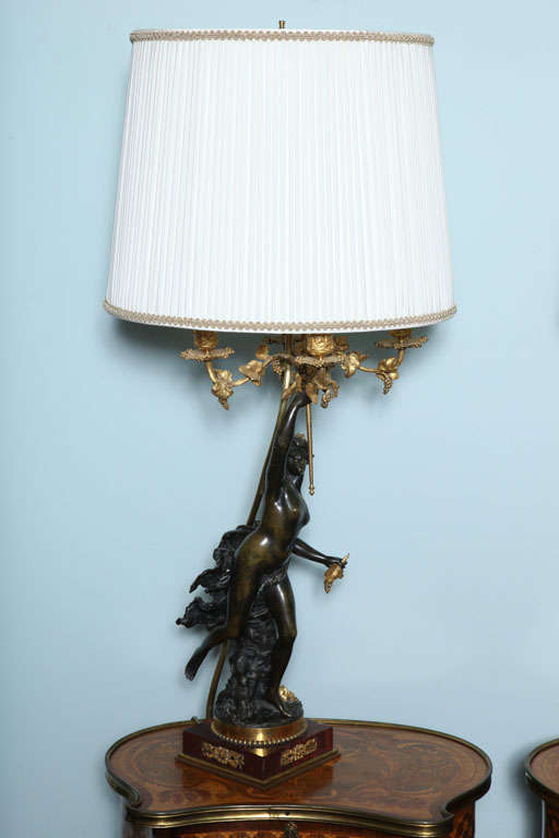 An elegant pair of bronze Candelabra lamps by Denier.