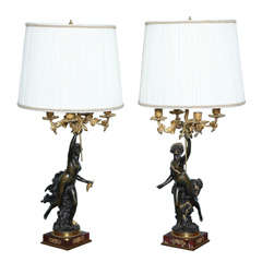 An elegant pair of bronze Candelabra lamps by Denier.