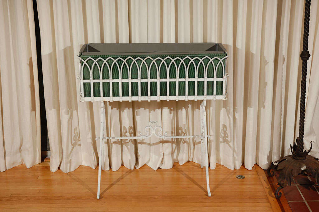 Hand wrought iron stand for plants with gothic picket edging, pierced green insert for covering liner. New liner available as well as original. Shown with new liner, original liner shown in image 10. Base measures 19