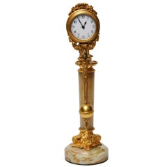 Horloge mystérieuse néoclassique en bronze doré, France, 1880