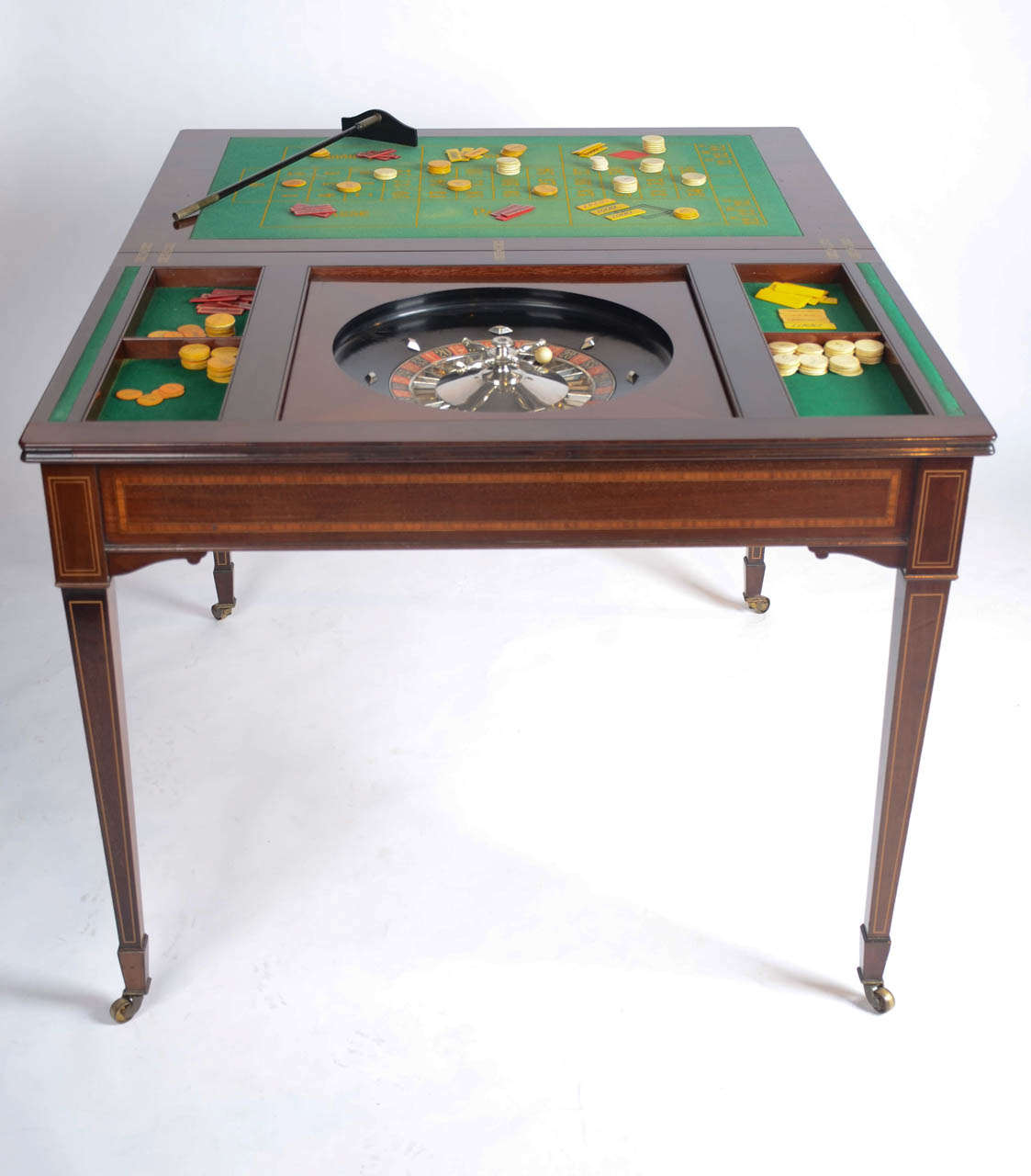Signed by Sir Hiram Maxim this Unique Games Table was designed and custom made in 1907 for Sir Hiram Maxim, at the behest of King Edward VII whose circle of friends included Lord Roslyn, an avid gambler. Roslyn was certain that he had a system at