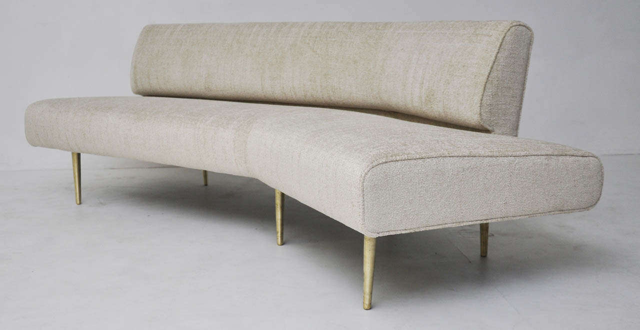 Dunbar channel back sofa with solid brass legs.  Fully restored, newly upholstered.