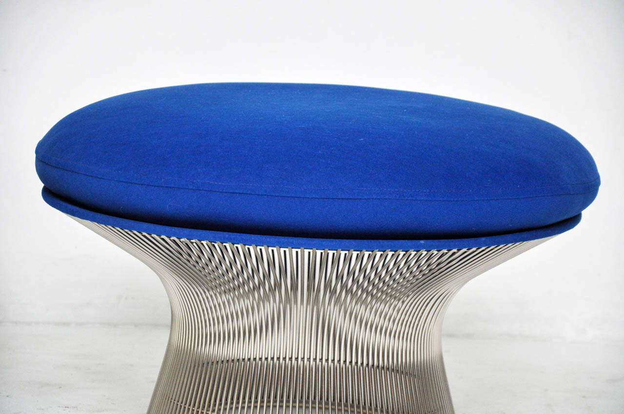 Ottoman/stool by Warren Platner for Knoll.  Nickel frame with original blue upholstery.