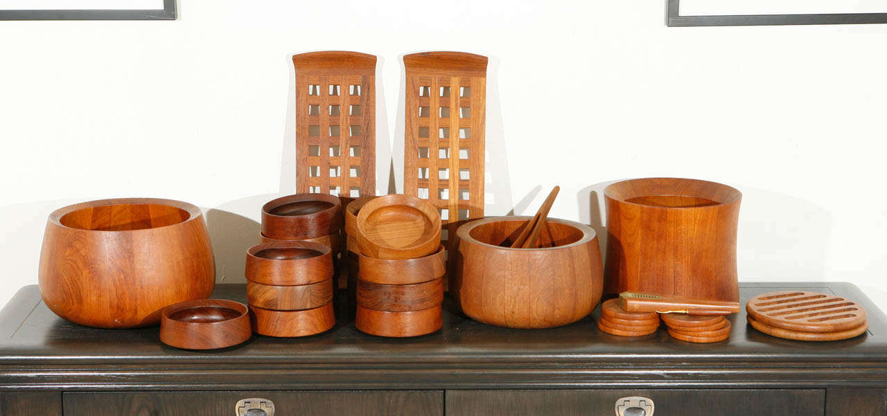 There's nothing quite like the original 1960s Dansk pieces. Made of heavy teak, they are truly irreplaceable. We have an outstanding collection of Dansk, featuring two trivets, two trays, three salad bowls, a nutcracker, serving tongs, eight