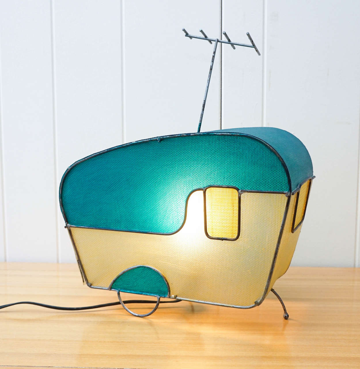 A Two-Toned Trailer Desk Lamp by artist Daniel Sadler (1957-2004)  This lamp is made from a unique medium, consisting of a wire mesh and plastic composite material, formed onto a welded wire framework, which was then hand-painted.