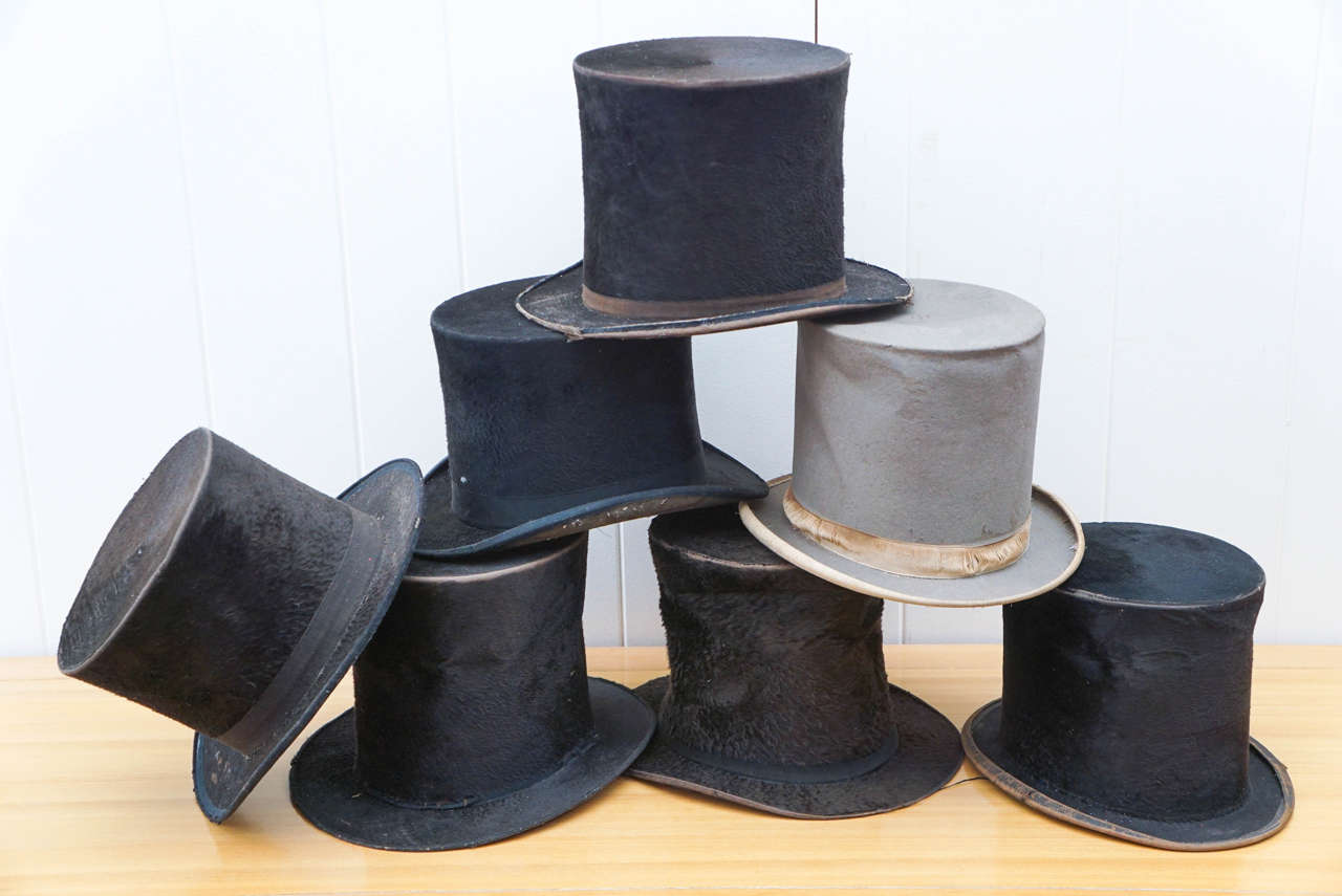A set of seven Beaver Top hats ca. 1850  They were worn previously and have wear and tear on them.  This lot has a mix of American and European designs