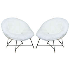 A pair of Augusto Bozzi for Saporiti  lounge chairs upholstered  in sheepskin.