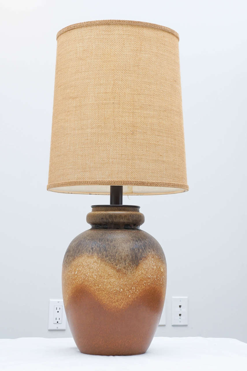 Gutsy mid century Italian pottery table lamp with its Raymor label and original shade.