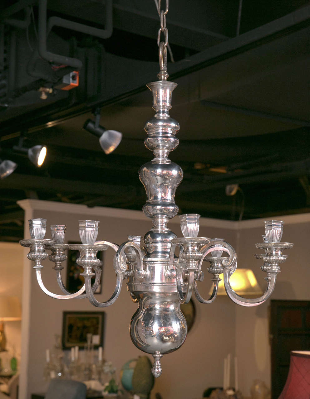 A Caldwell silver-plated, eight light chandelier circa 1900.