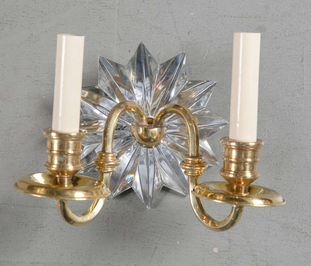 Pair of gilt bronze starburst sconces, circa 1930. 12 available, priced per pair.