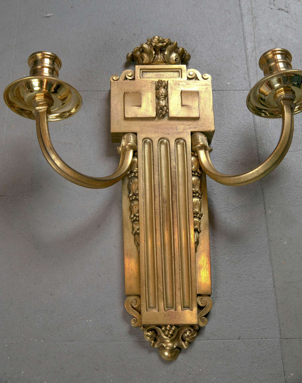 Pair of neoclassical style Caldwell sconces. C.1910. Four available, priced per pair, will be newly wired upon purchase.