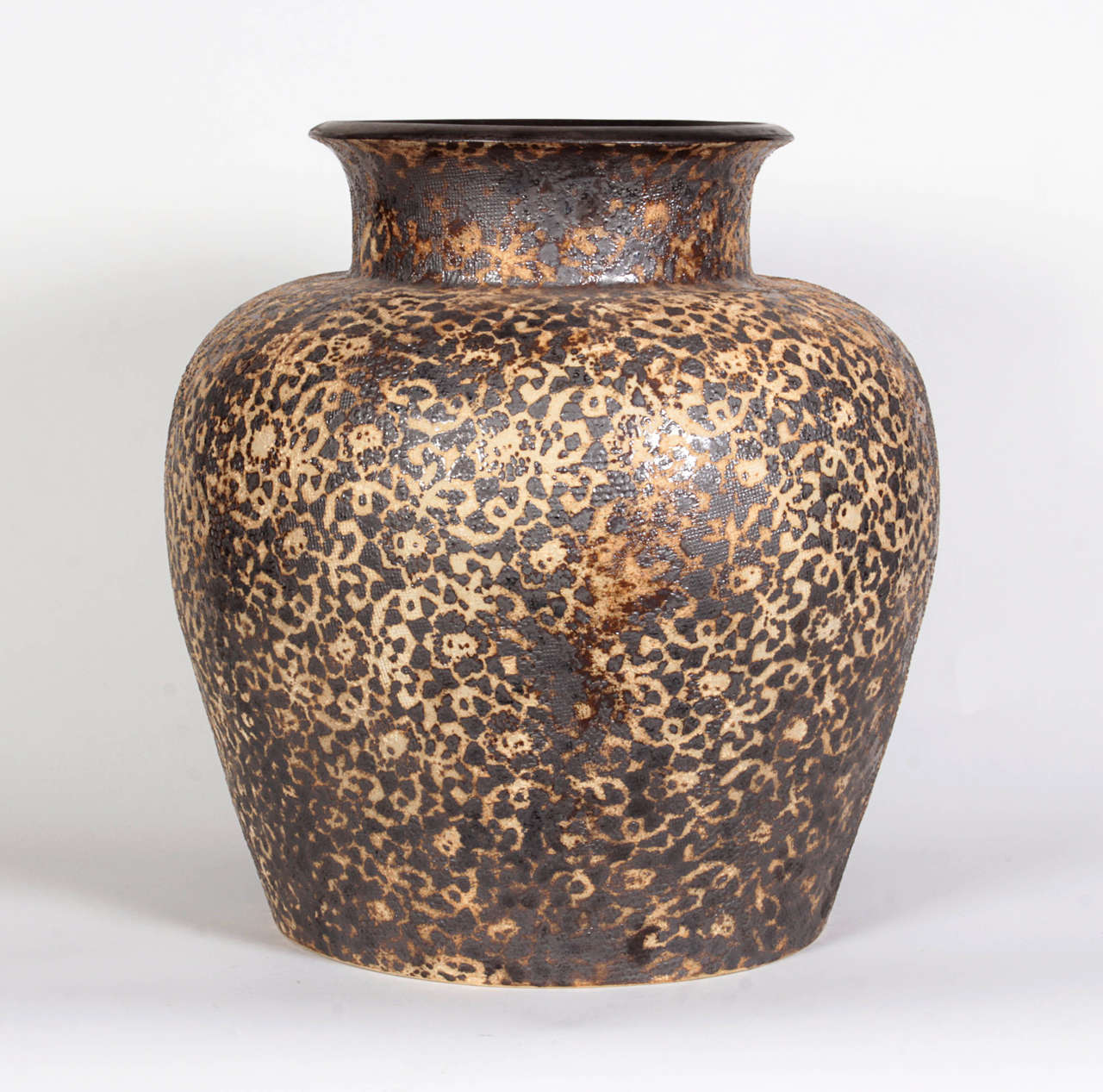 Brown and beige Thai ceramic vase with pebble finish. Curated and personally selected by Donna Karan for her Urban Zen brand.