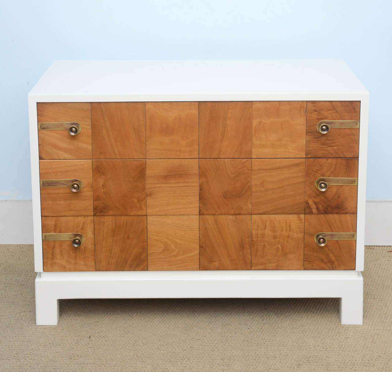 Beautiful two-toned dresser designed by Renzo Ruttili for Johnson Furniture Co. This piece is signed and it still retains its original John Stuart showroom label. The piece has been totally refurbished and it is in excellent condition. The frame has