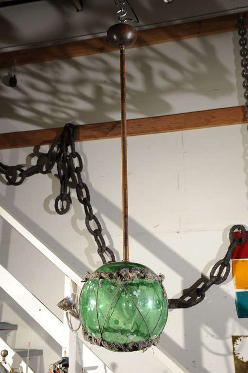 Antique japanese fishing float made into pendant light.  Original rope and barnacles.  UL listing available for an additonal fee.  Stem can be shortened or lengthened.  Height includes stem.