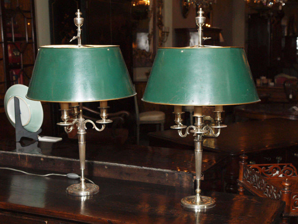 Pair French silver plate bouillotte lamps. Tole shades.