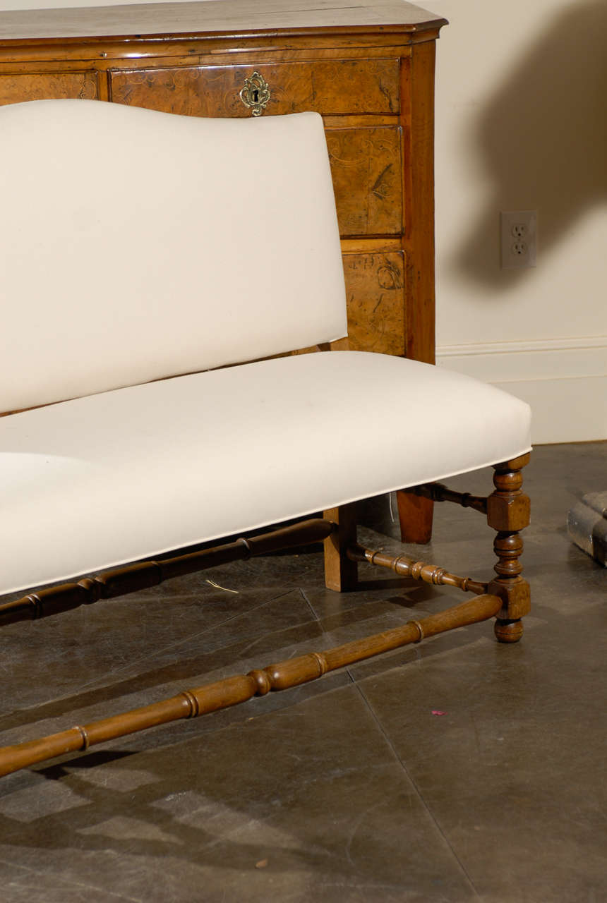 antique upholstered bench with back