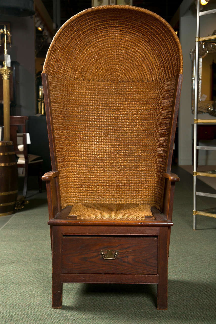 An English Orkney chair with single drawer and high back.