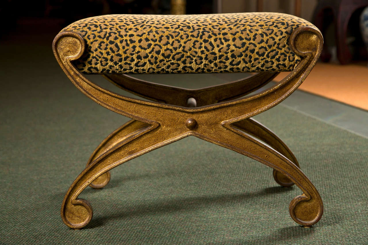 A 20th century Regency style cast iron curule form small bench.