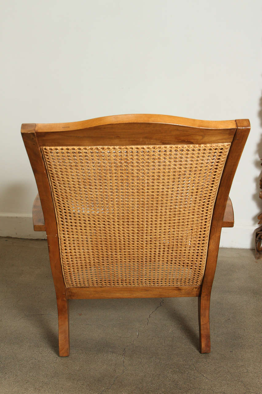 Anglo Indian Plantation Chair and Ottoman 2