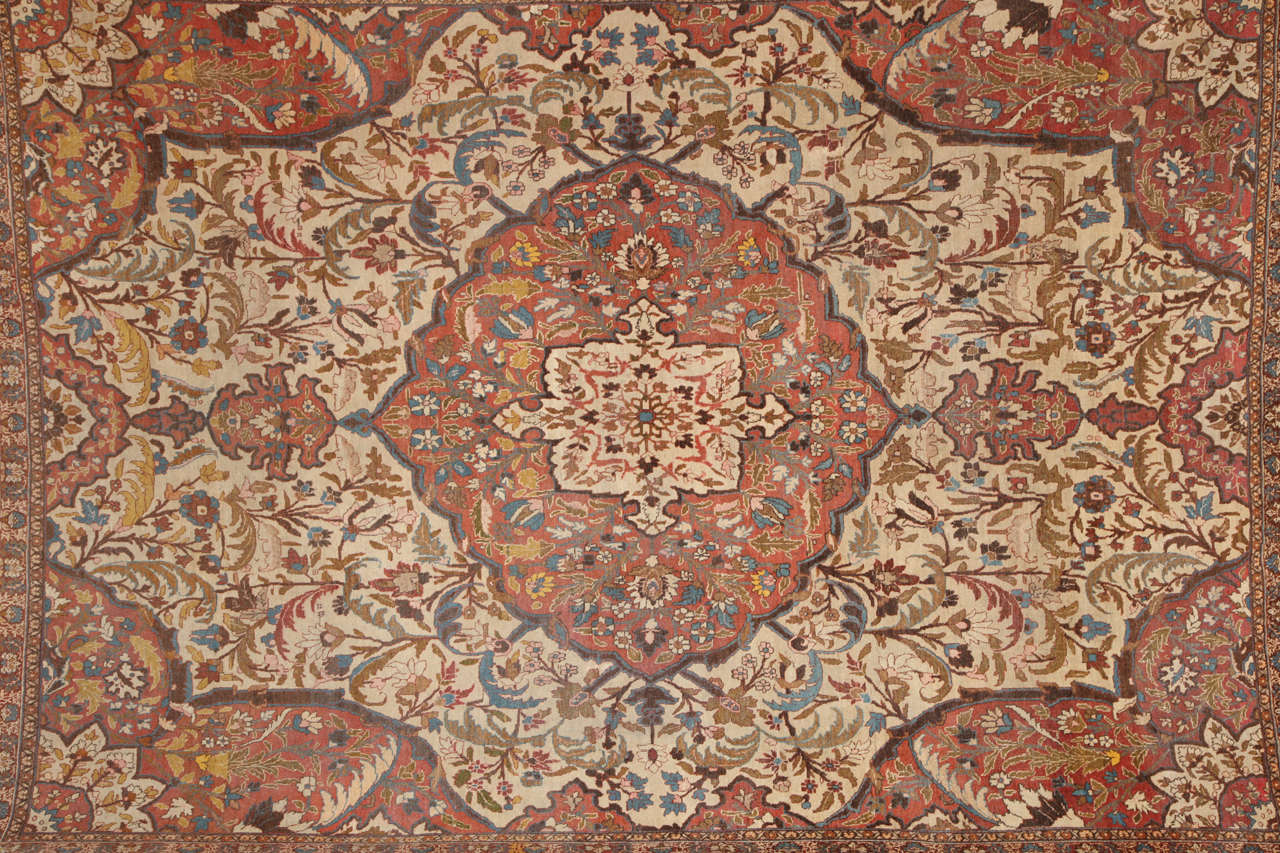 This Persian Haji Jalili Tabriz carpet circa 1880 consists of a cotton warp and thread, hand-knotted wool pile and natural vegetable dyes. It is an exceptional piece from the workship of master weaver Haji Jalili, one of the foremost artists of his
