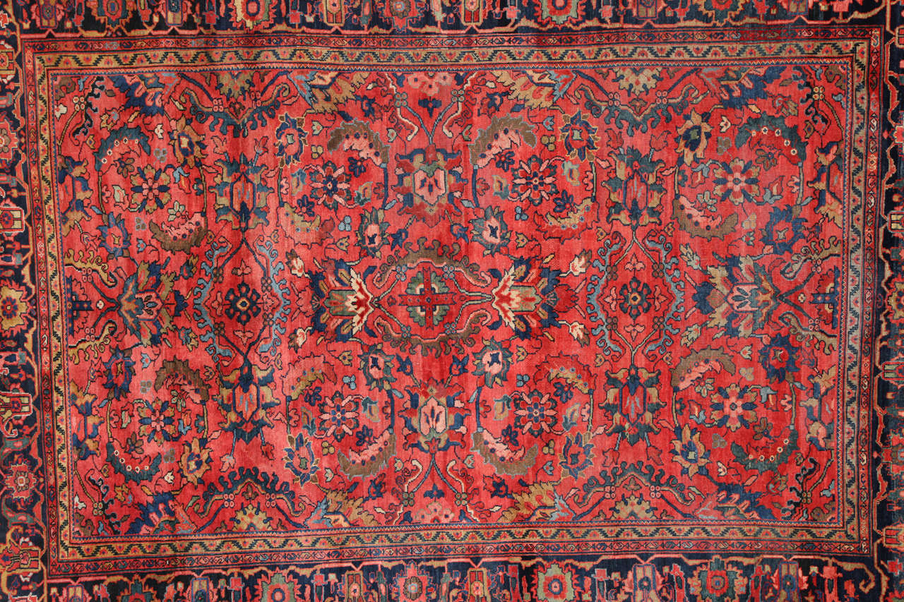 This Persian Lilihan carpet exhibits an Afshan design in handspun hand-knotted wool and natural vegetable dyes, circa 1910. It is in excellent antique condition, and the size is 8'4