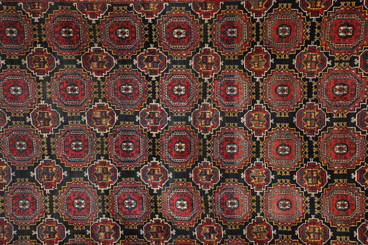 This Persian Amal Ziegler Bakhtiari carpet, circa 1890 consists of a handspun hand-knotted wool pile and natural vegetable dyes. The size is 11'7