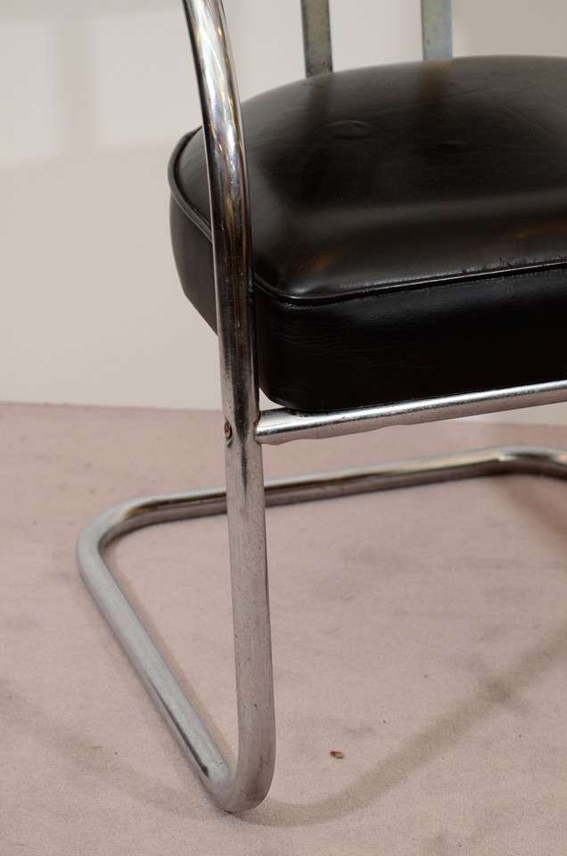 mid century tubular chrome chairs