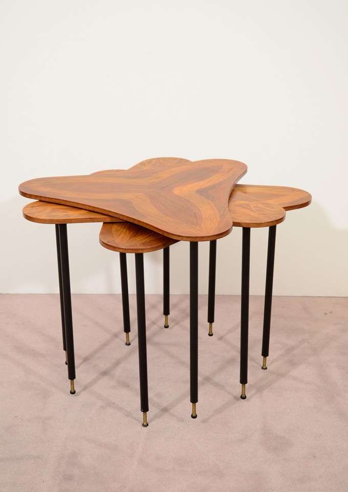A set of three Scandinavian stacking tripod tables with metal and ebonized wood legs. The surface of each has a different wood inlay design. They are stamped Martin Mobler, Norway on the bottom.