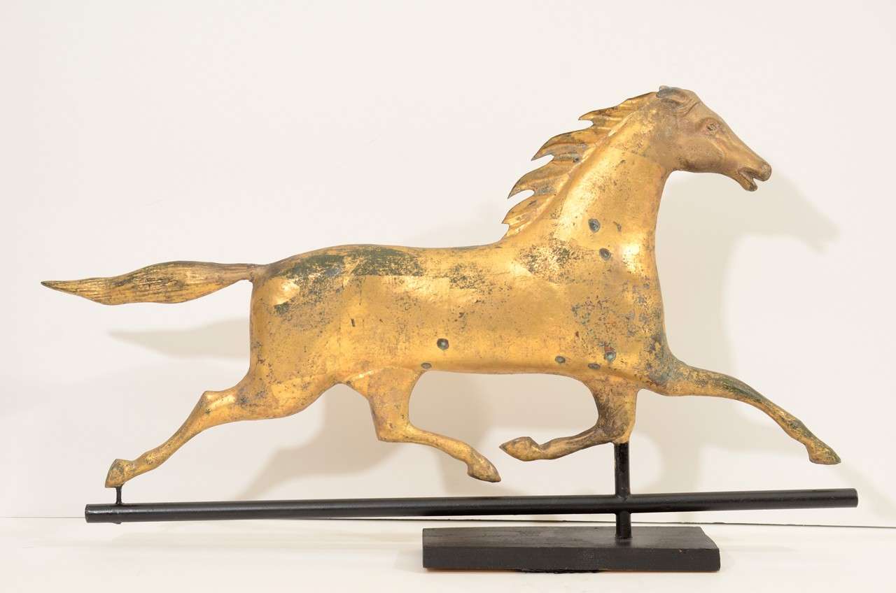 A vintage weather vane in the shape of a horse. the piece is copper with a gilt finish. It is in good vintage condition with age appropriate wear/patina. There are some depression that may be from BB's/pellets but no holes.

Reduced from $14,000