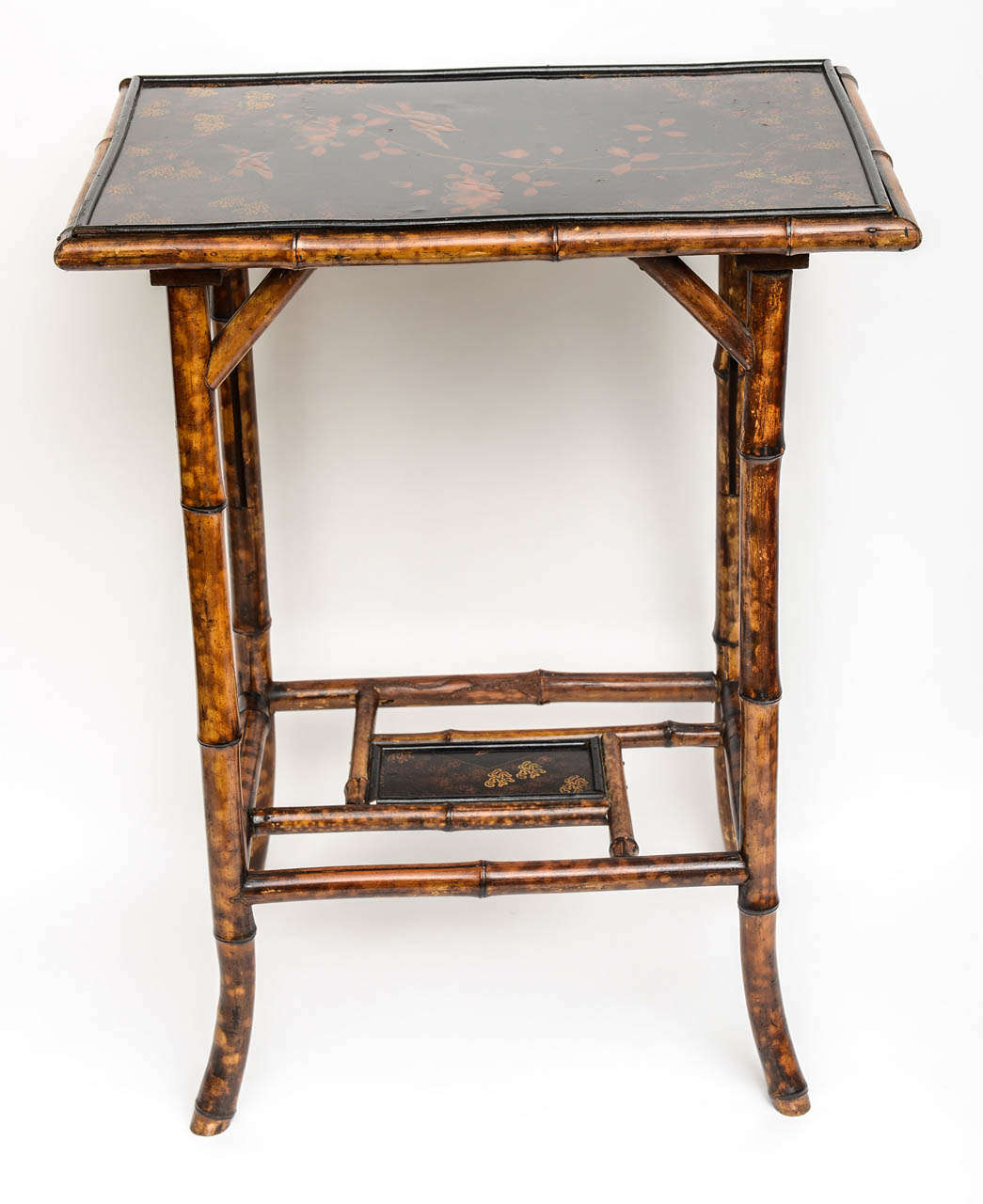 Beautiful rectangular English bamboo table with Japanning on both tops.