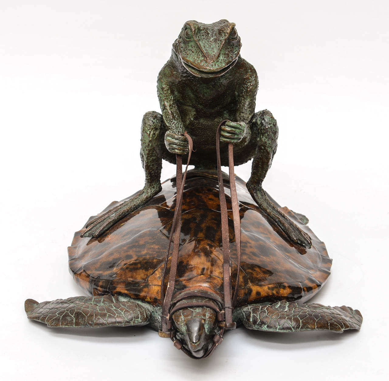 Whimsical vintage bronze frog riding on large enameled tortoise.