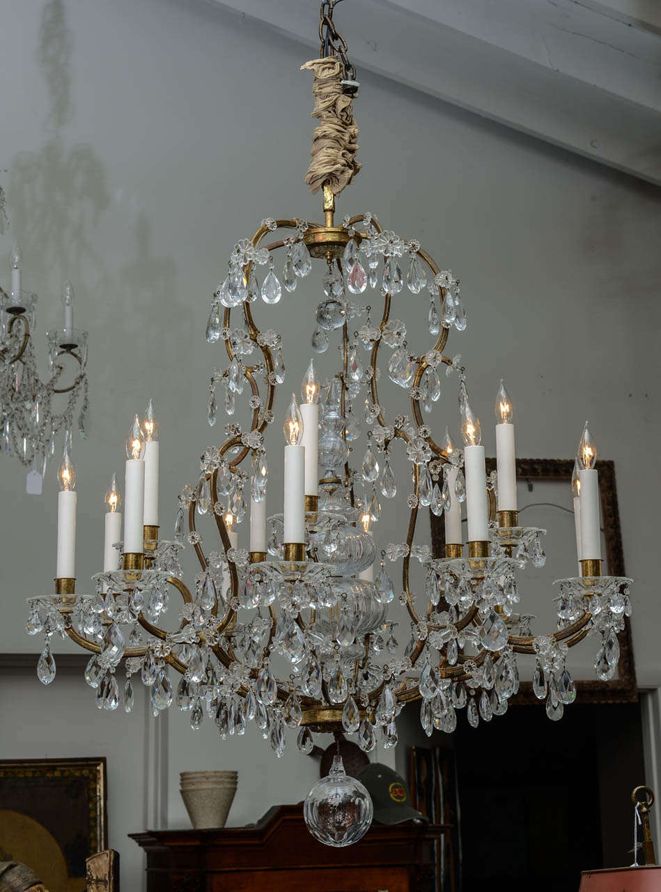 Magnificent French crystal chandelier with bulbous crystal center pillar. 20 lights.