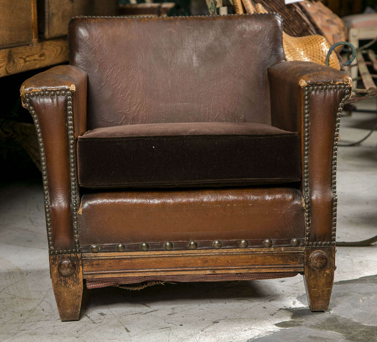 Charming French Leather childs chair with new velvet covered cushion. Original nail head trim.