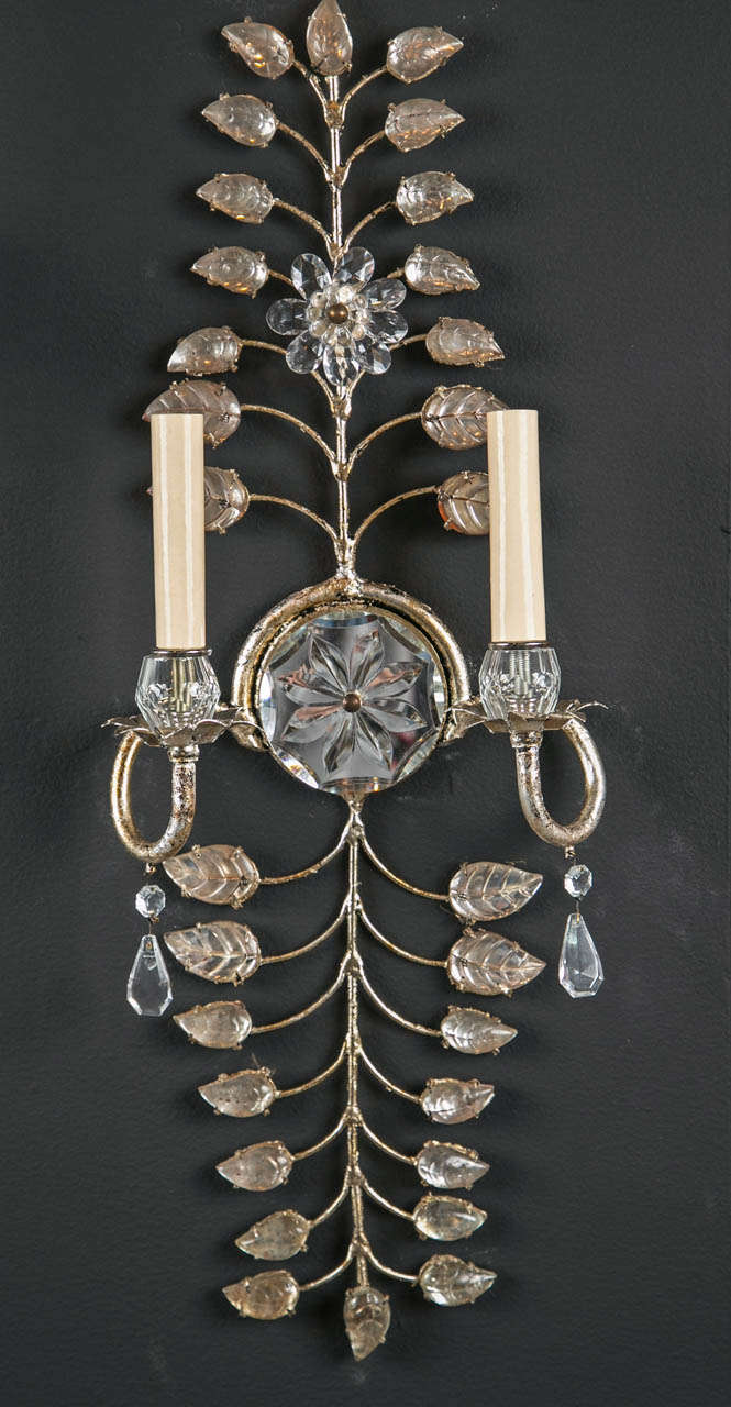 A fabulous set of six, circa 1930s French crystal sconces with silver leaf and crystal leaves.