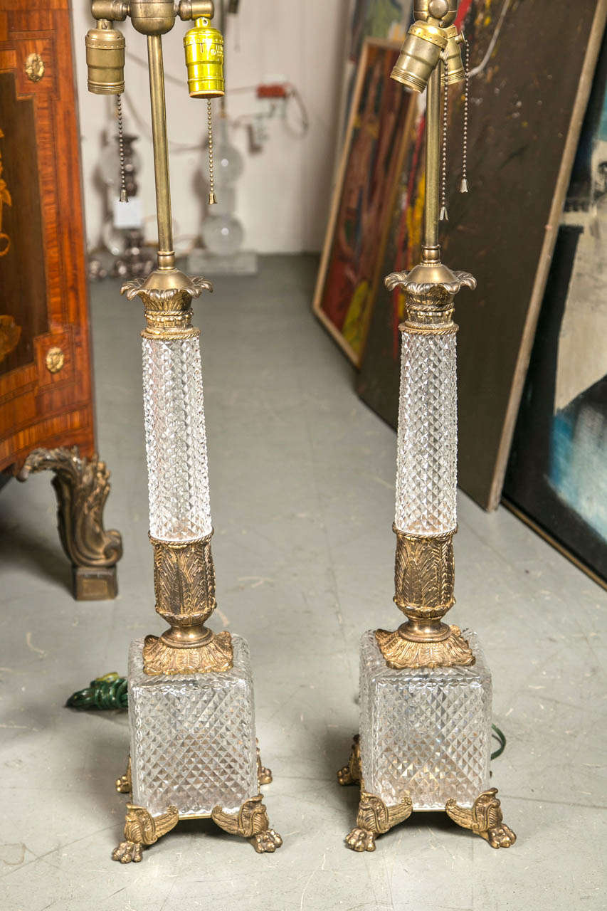 A beautiful pair of antique Baccarat diamond cut crystal and Dore bronze lamps circa 1900.