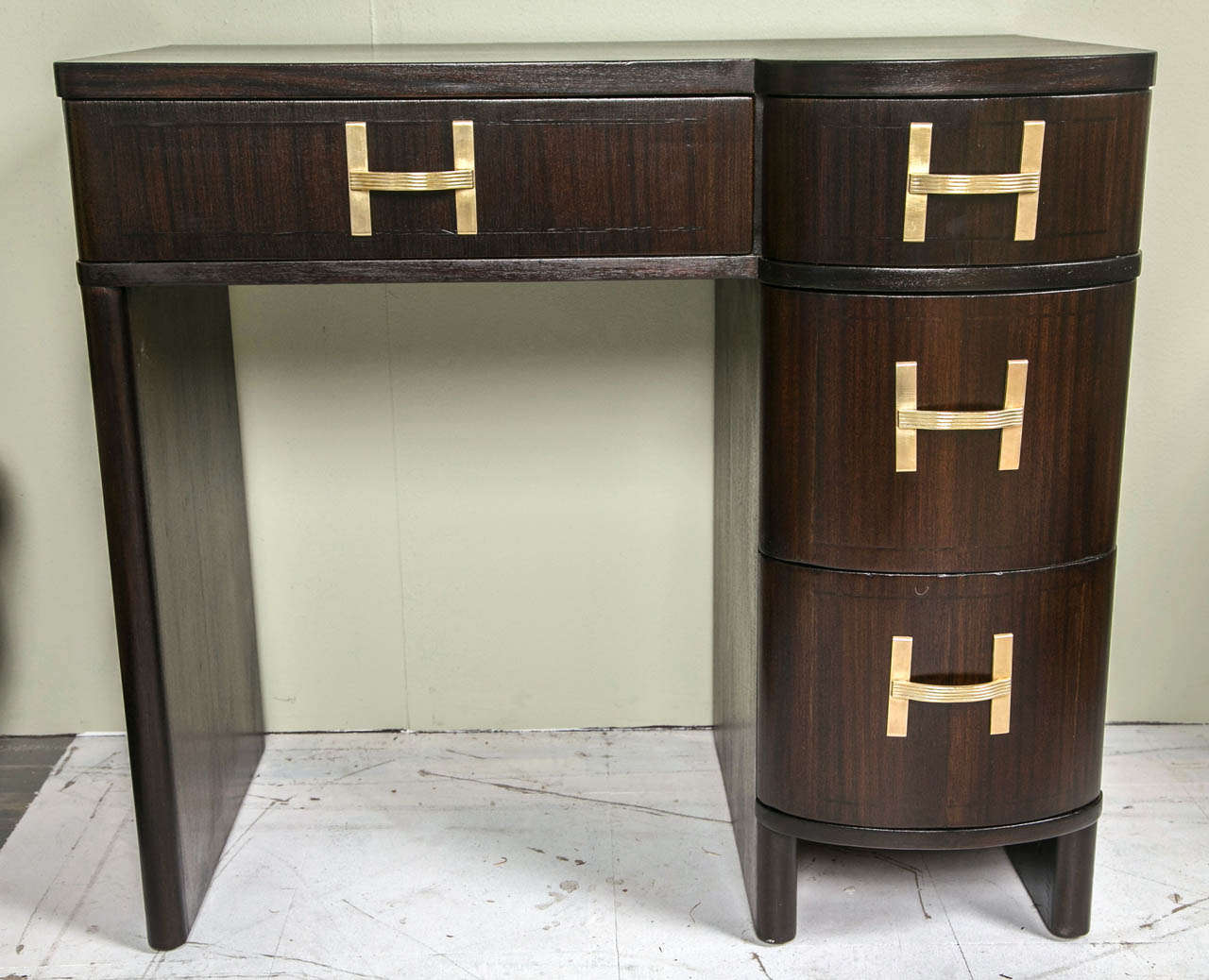 1920's mahogany Art Deco desk, with fabulous oversized hardware.